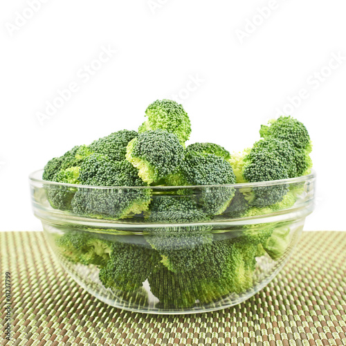 Photo: Glass bowl full of green broccoli Glass bowl full of green broccoli