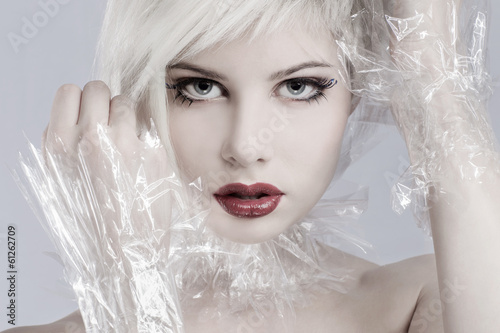 Photo: Blonde woman model in plastic Blonde woman model in plastic