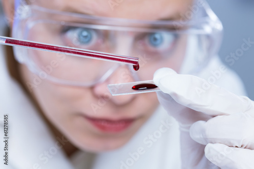 Photo: woman with test tubes in a chemistry woman with test tubes in a chemistry