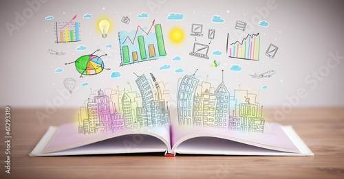 Photo: drawing of a business scheme on an opened book drawing of a business scheme on an opened book