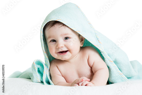 Photo: Cute happy baby in towels Cute happy baby in towels