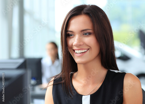 Photo: Modern business woman in the office Modern business woman in the office