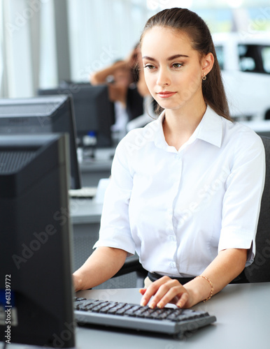 Photo: Modern business woman in the office Modern business woman in the office