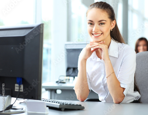 Photo: Modern business woman in the office Modern business woman in the office