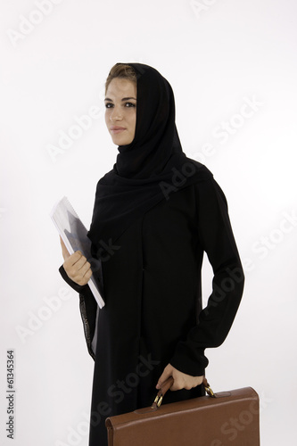 Photo: A Young Arab Woman Teacher Going To Work A Young Arab Woman Teacher Going To Work
