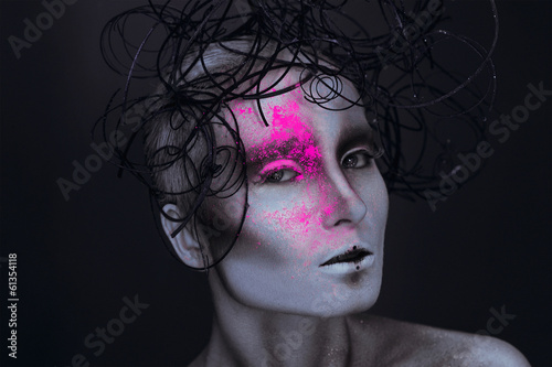 Photo: Sexy adult female with neon powred on face Sexy adult female with neon powred on face