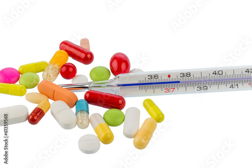 Photo: Fieberthermometer und Tabletten Fieberthermometer und Tabletten