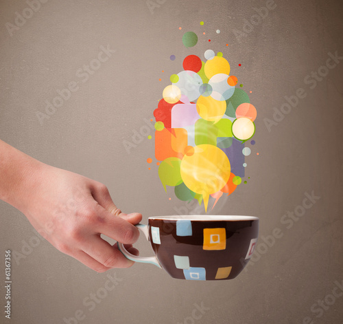 Photo: Tea cup with colorful speech bubbles Tea cup with colorful speech bubbles