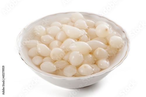 Photo: White onions in a bowl White onions in a bowl