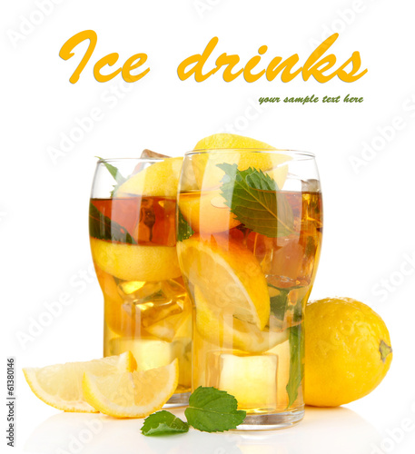 Photo: Iced tea with lemon and mint isolated on white Iced tea with lemon and mint isolated on white