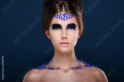 Photo: Fantasy. Artistic Woman with Fancy Creative Make-up. Glamour Fantasy. Artistic Woman with Fancy Creative Make-up. Glamour