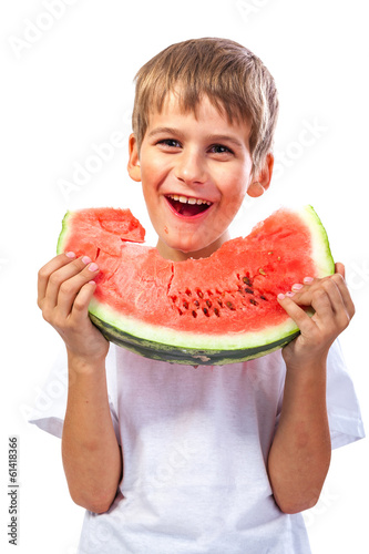 Photo: Boy is eating a watermelon Boy is eating a watermelon