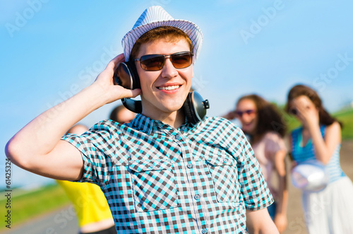 Photo: young man in sunglasses young man in sunglasses