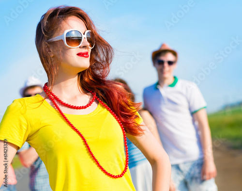 Photo: stylish young woman in sunglasses stylish young woman in sunglasses