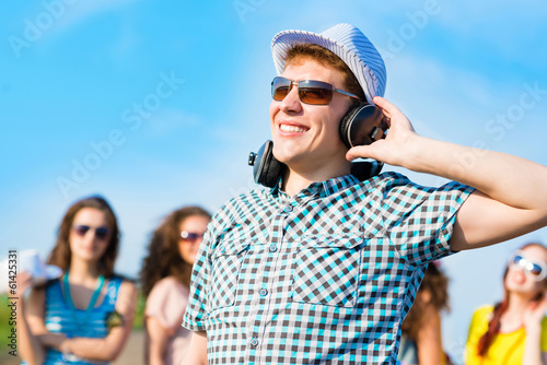 Photo: young man in sunglasses young man in sunglasses