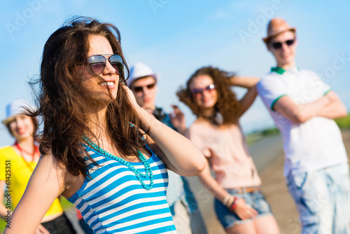 Photo: stylish young woman in sunglasses stylish young woman in sunglasses