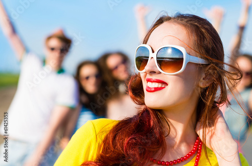 Photo: stylish young woman in sunglasses stylish young woman in sunglasses