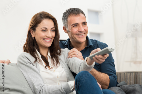 Photo: Couple Watching Television Couple Watching Television