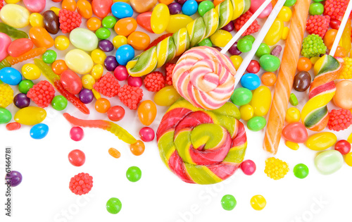 Photo: Different colorful fruit candy close-up Different colorful fruit candy close-up