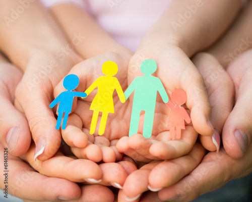 Photo: Paper family in hands Paper family in hands