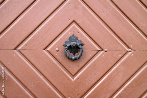 Photo: Türklopfer am Tor des alten Spritzenhauses in Alverdissen Türklopfer am Tor des alten Spritzenhauses in Alverdissen