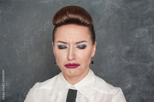 Photo: Beautiful woman with sad expression Beautiful woman with sad expression
