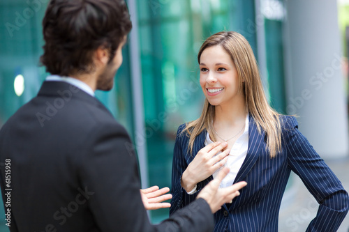 Photo: Business people talking Business people talking