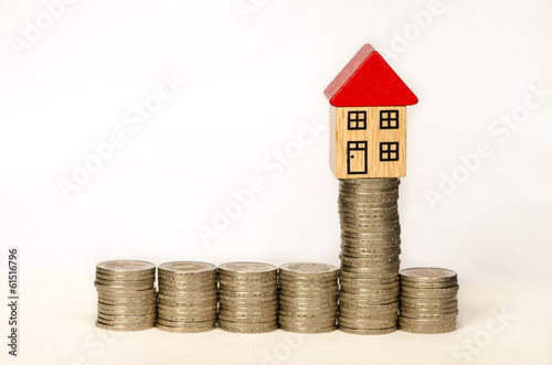 Photo: coins and house coins and house