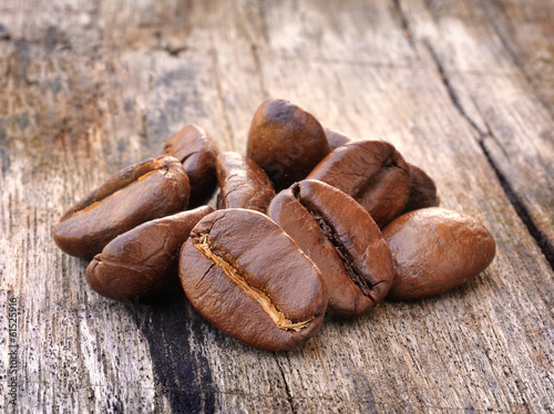 Photo: Coffee on grunge wooden background Coffee on grunge wooden background