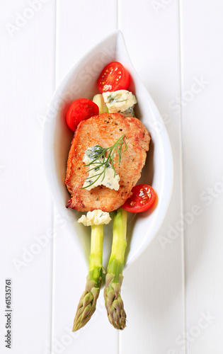 Photo: Pork chop with blue cheese and vegetables Pork chop with blue cheese and vegetables