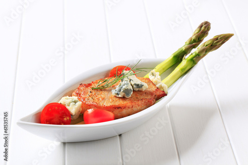 Photo: Pork chop with blue cheese and vegetables Pork chop with blue cheese and vegetables