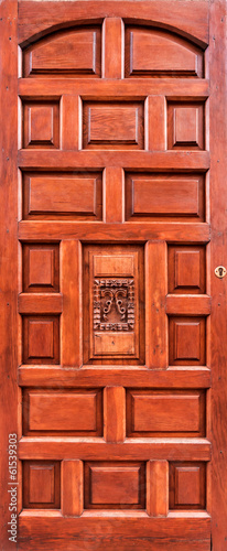 Photo: Ancient wooden brown door Ancient wooden brown door