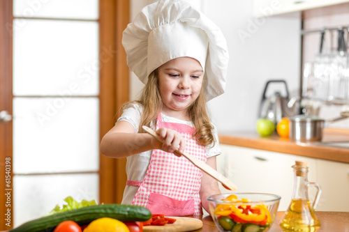 Photo: kid cooking at kitchen kid cooking at kitchen