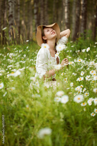 Photo: Girl in the meadow of daisies Girl in the meadow of daisies