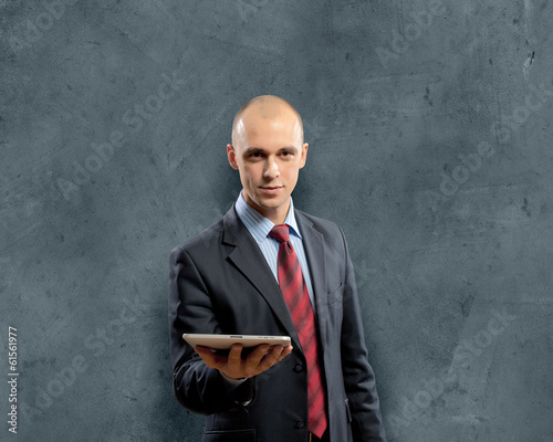 Photo: Man with tablet pc Man with tablet pc