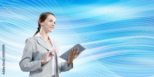 Photo: Woman with tablet pc Woman with tablet pc