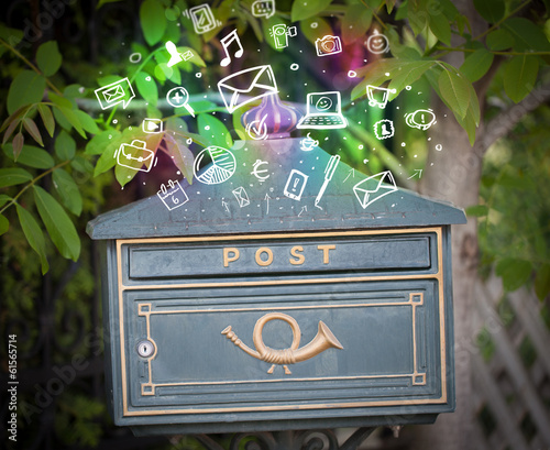 Photo: Colorful icons and symbols bursting out of a mailbox Colorful icons and symbols bursting out of a mailbox