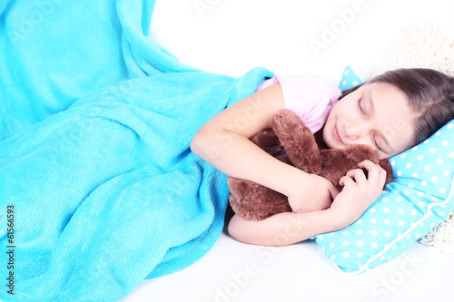 Photo: Beautiful little girl sleeping, close-up Beautiful little girl sleeping, close-up