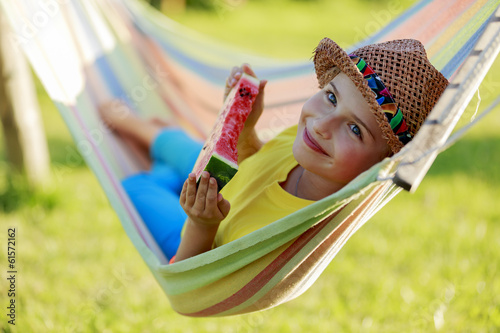 Photo: Summer joy - lovely girl eating fresh watermelon Summer joy - lovely girl eating fresh watermelon