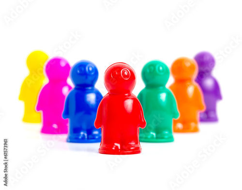 Photo: Leadership - colorful toy people group with leader in front of Leadership - colorful toy people group with leader in front of