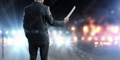 Photo: Business man on stage Business man on stage