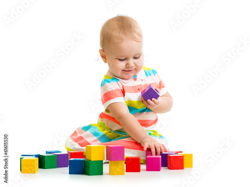 Photo: kid playing with block toys kid playing with block toys