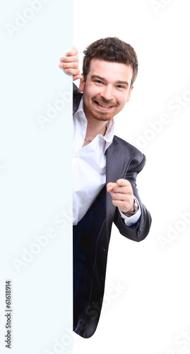 Photo: Happy business man presenting with copy space for your text Happy business man presenting with copy space for your text