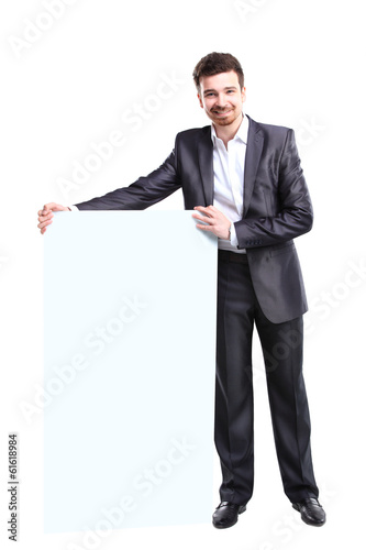 Photo: Happy business man presenting with copy space for your text Happy business man presenting with copy space for your text