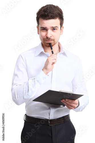 Photo: Portrait of cheerful businessman making notes Portrait of cheerful businessman making notes