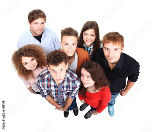 Photo: Group of happy joyful friends isolated on white background Group of happy joyful friends isolated on white background