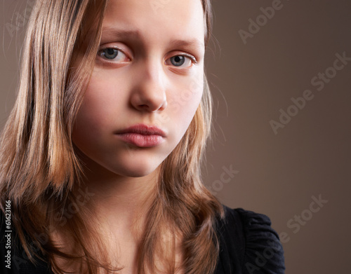 Photo: Depressed teen girl Depressed teen girl