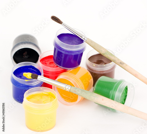 Photo: Gouache and brushes isolated on white background Gouache and brushes isolated on white background