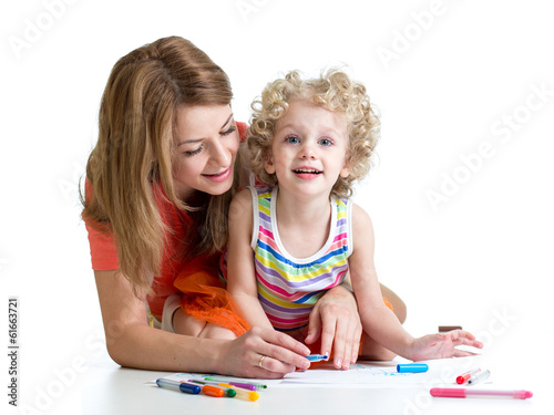 Photo: little child with mother drawing with color pen over white little child with mother drawing with color pen over white