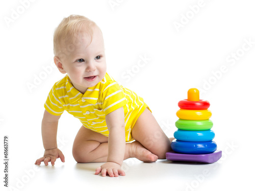 Photo: baby boy playing with educational toy baby boy playing with educational toy